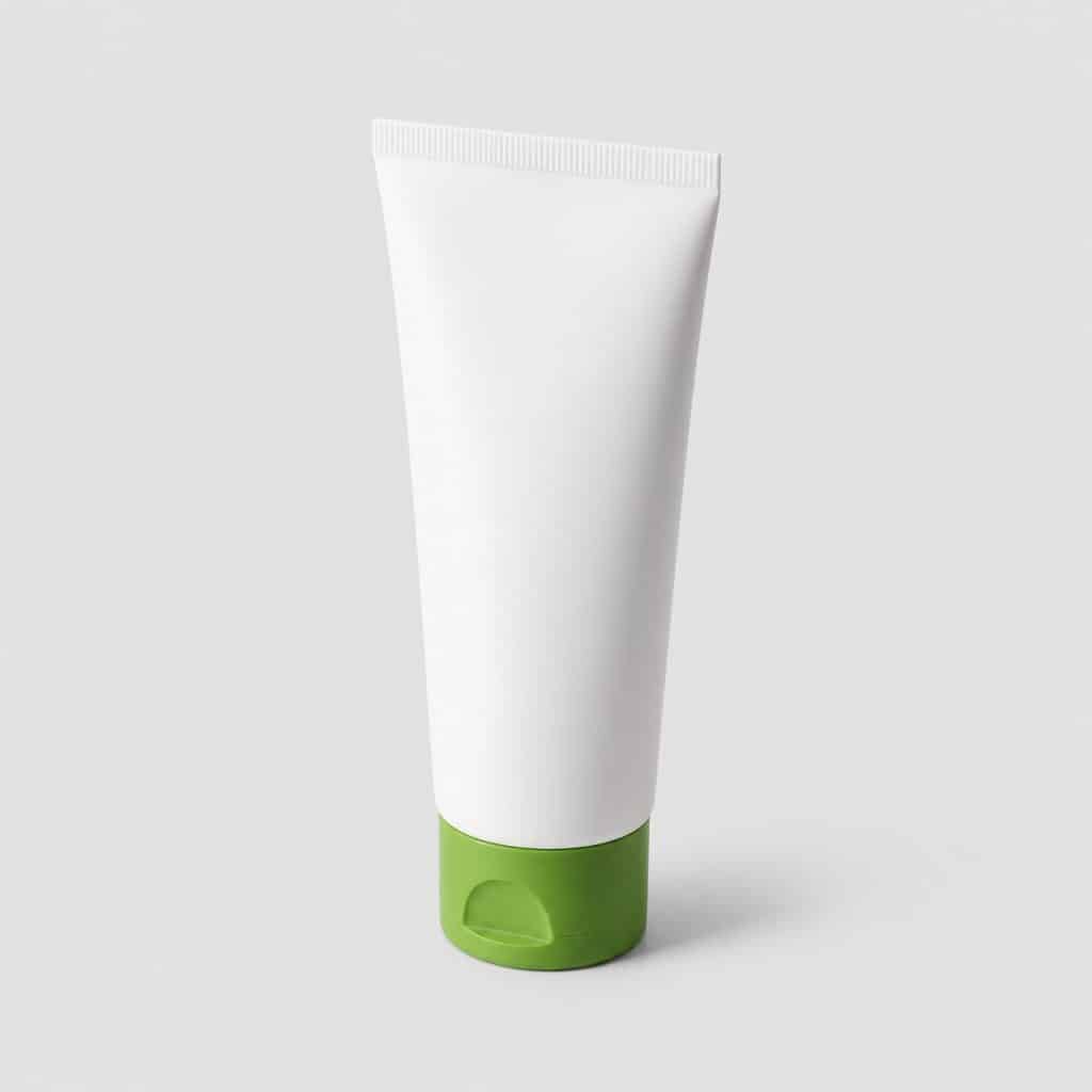 Tube de crème apaisante jambes lourdes posé sur fond clair