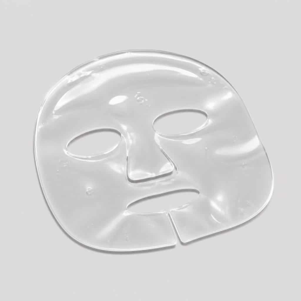 Masque hydrogel au collagène posé à plat sur fond clair