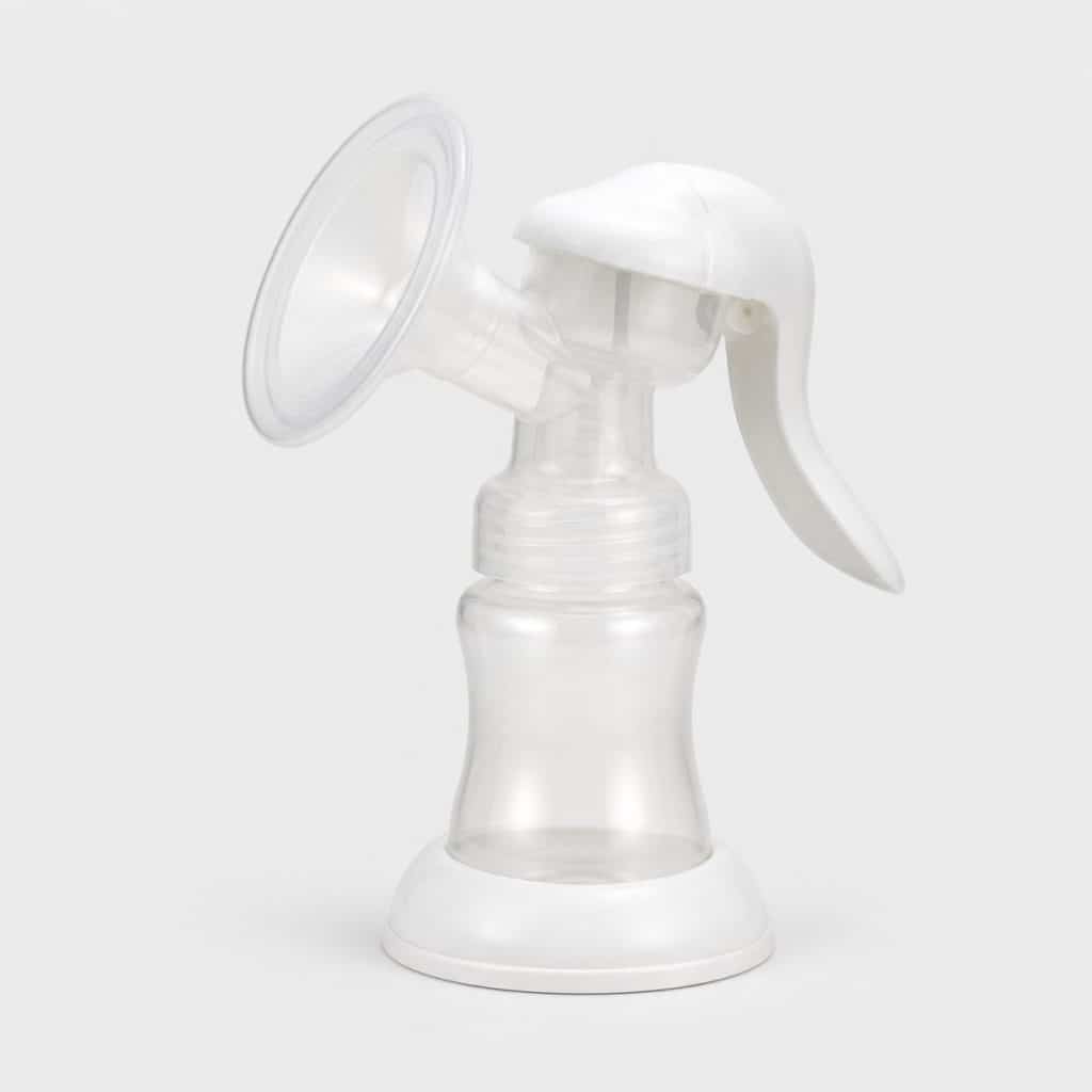 Tire-lait manuel sur fond neutre