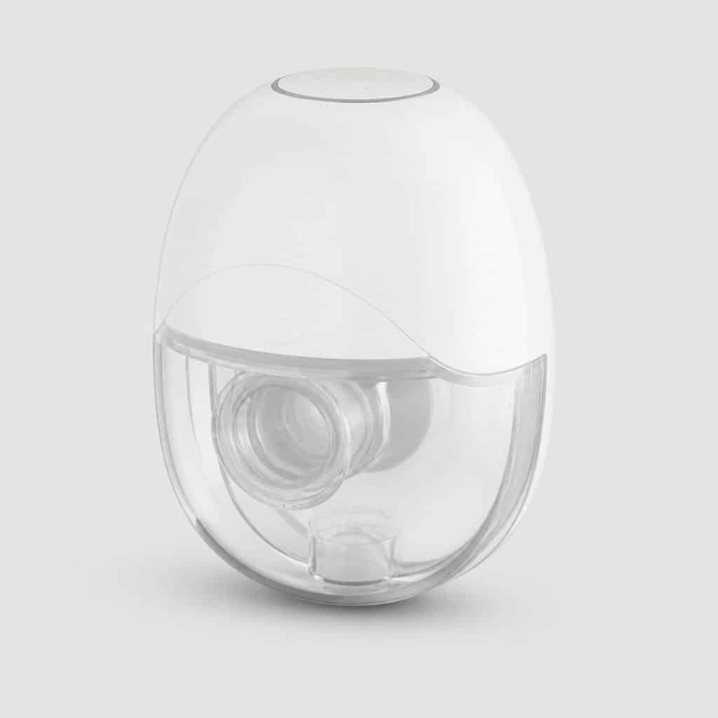 Tire-lait portable sans fil sur fond neutre